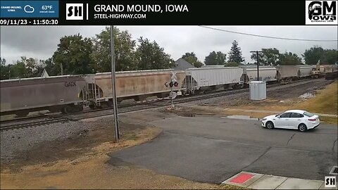 EB Manifest with Old Passenger on end of train in Belle Plaine and Grand Mound, IA on 9-11-23