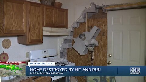 Driver plows into south Phoenix home, backs up and takes off