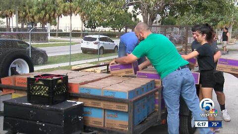 Volunteers help move thousands of Girl Scout cookies to local troops