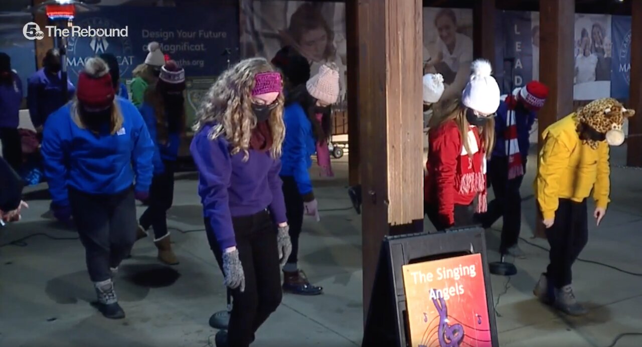 Special masks allows singing group to continue holiday tradition