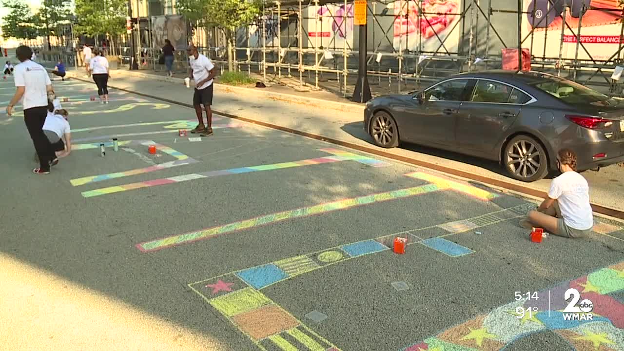 'Black Lives Matter' covers the street in Harbor Point