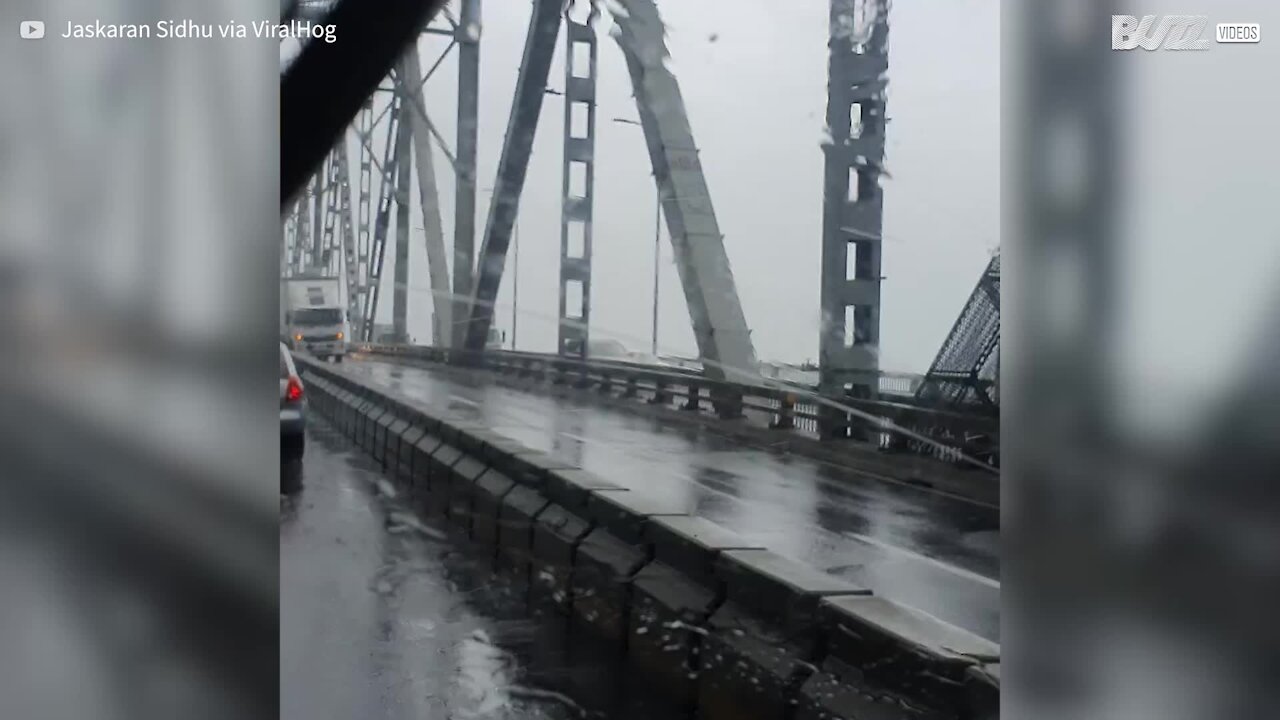 Strong winds knock over van