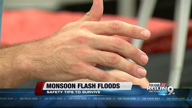 Hikers help each other out of dangerous flash floods in Sabino Canyon