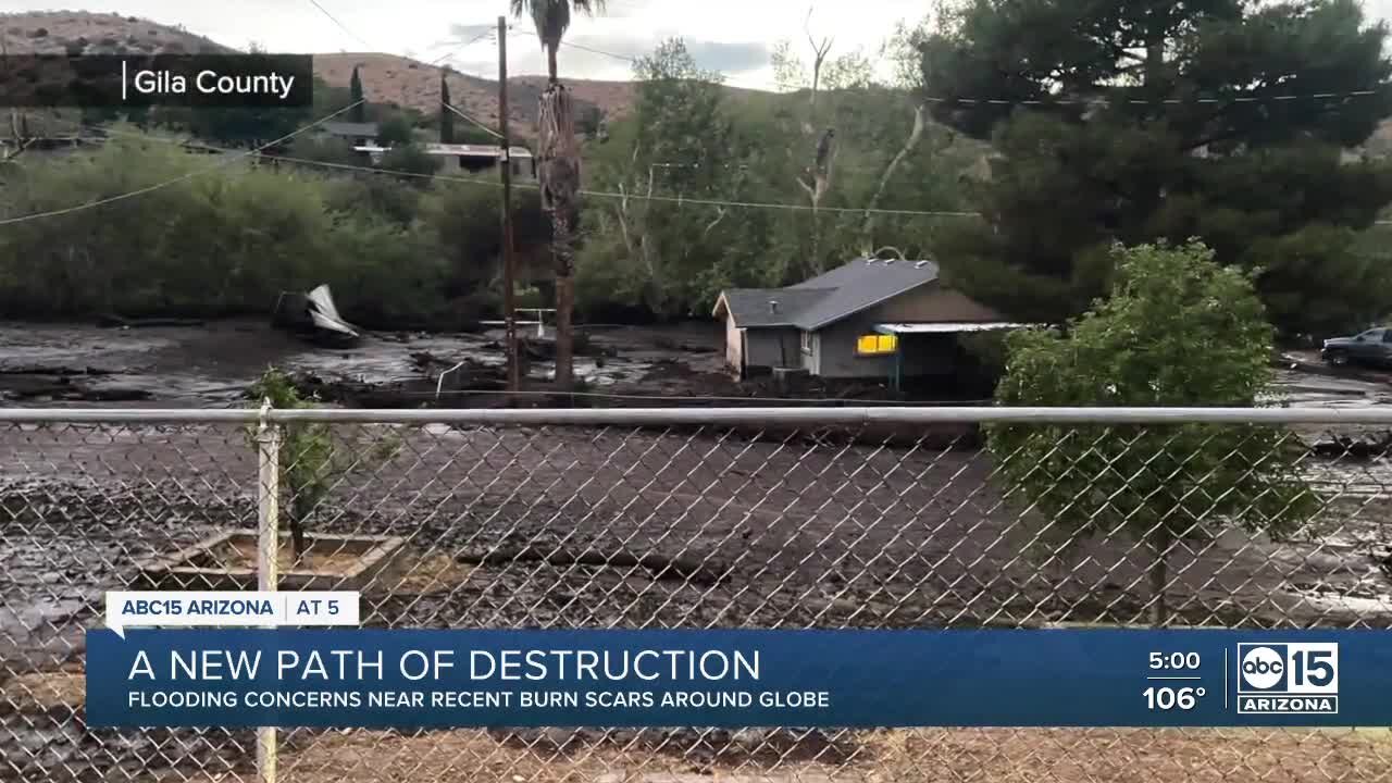 Homes damaged from debris flow along Gila County burn scars