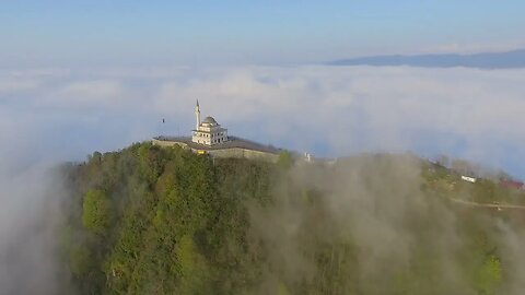 mixkit mosque in the top of a cloudy hill 9595 medium