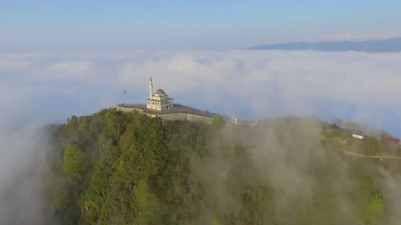 mixkit mosque in the top of a cloudy hill 9595 medium