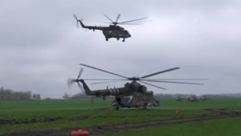 The crews of Mi-8 helicopters of the Russian Aerospace Forces provide cover for military columns from the air