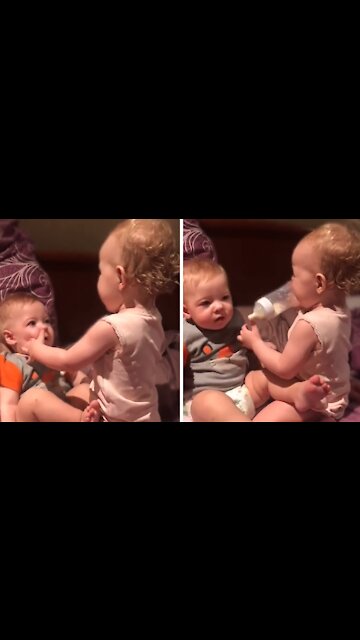 Toddler Hilariously Attempts To Bottle Feed Baby Brother