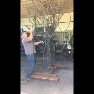 Man sculpts trees from metal in retirement