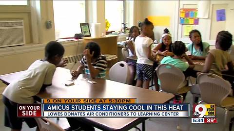 Volunteers fix up learning center for children from low-income families