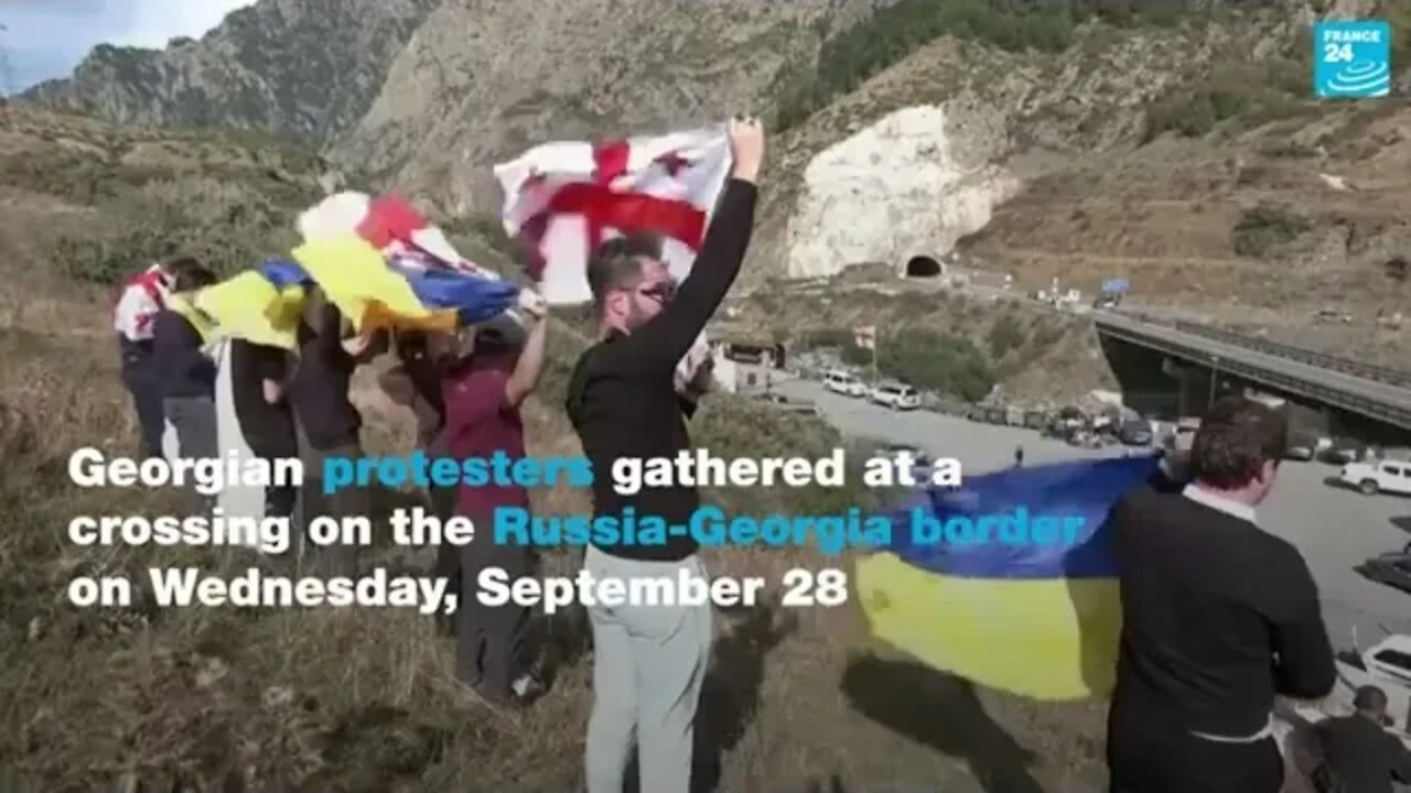 Georgian protesters gathered at a crossing on the Russia-Georgia border