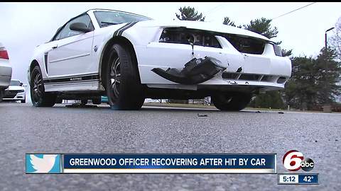 Greenwood police officer hit by car while directing traffic