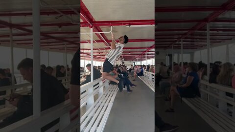 Doing pull-ups on a yacht in Istanbul for Andrew Tate