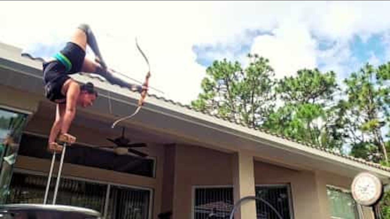 Woman dominates bow and arrow with her feet