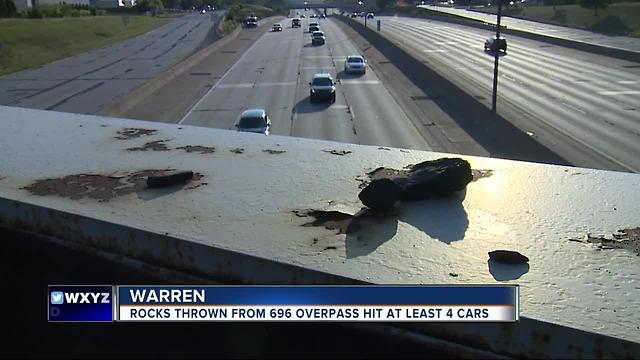 Four people caught throwing rocks from an overpass onto I-696 in Warren