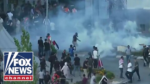 DEVELOPING - Riot police clash with protesters in West Bank