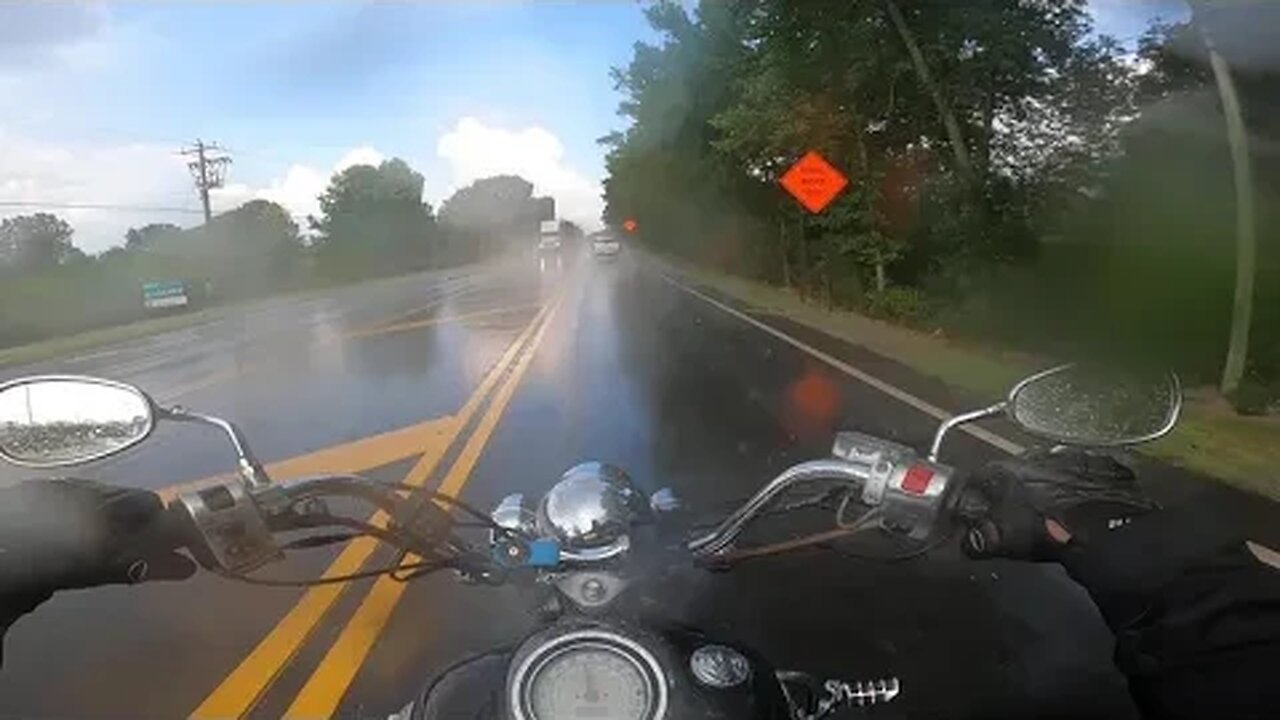 Unexpected Rain. Biker Gets Soaked!