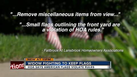 HOA orders homeowner to take down American flags from yard