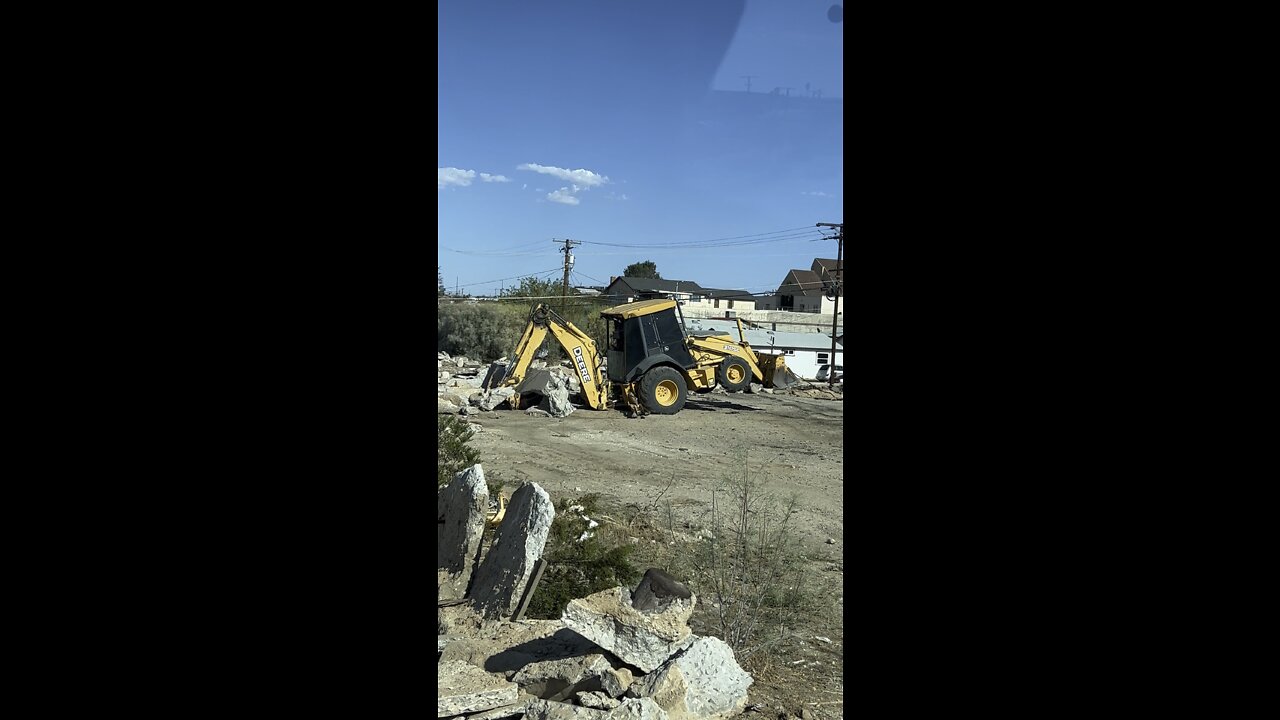 Backhoe Wheelie!