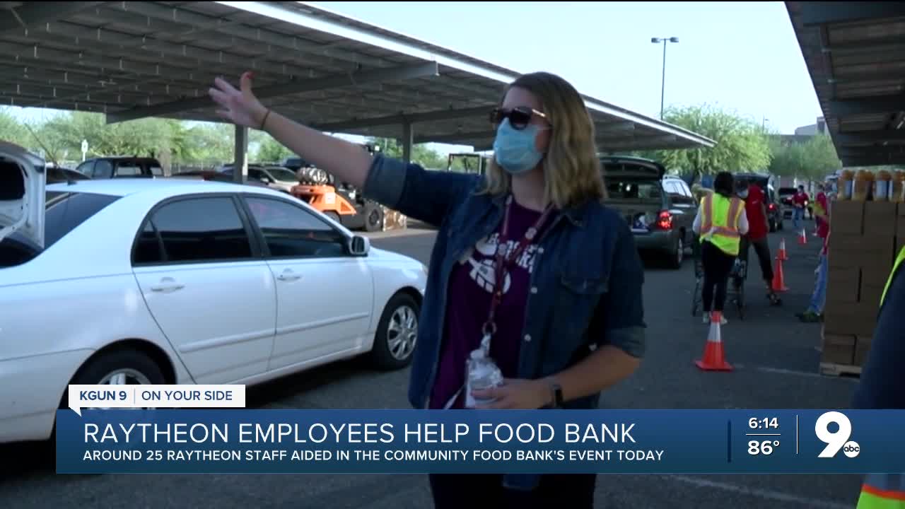 Raytheon teams up with food bank in drive-thru food donation event