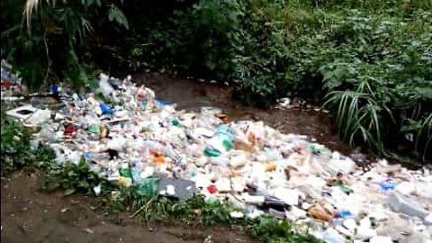 River of trash runs in the waters of Guatemala