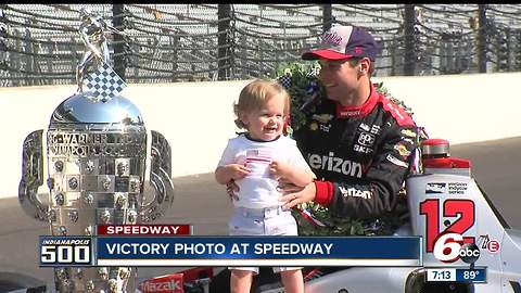 Will Power poses for victory photos