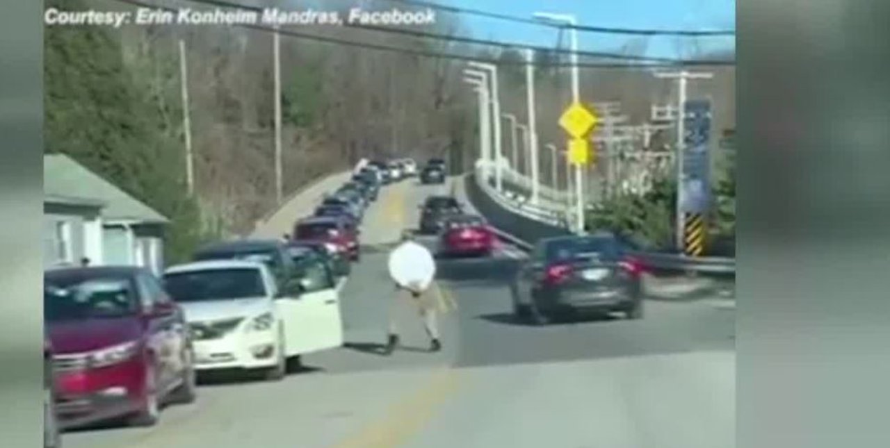 Man dances during traffic jam