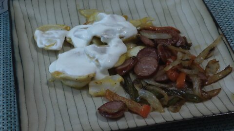 Kielbasa and Pierogies w/ peppers & onions