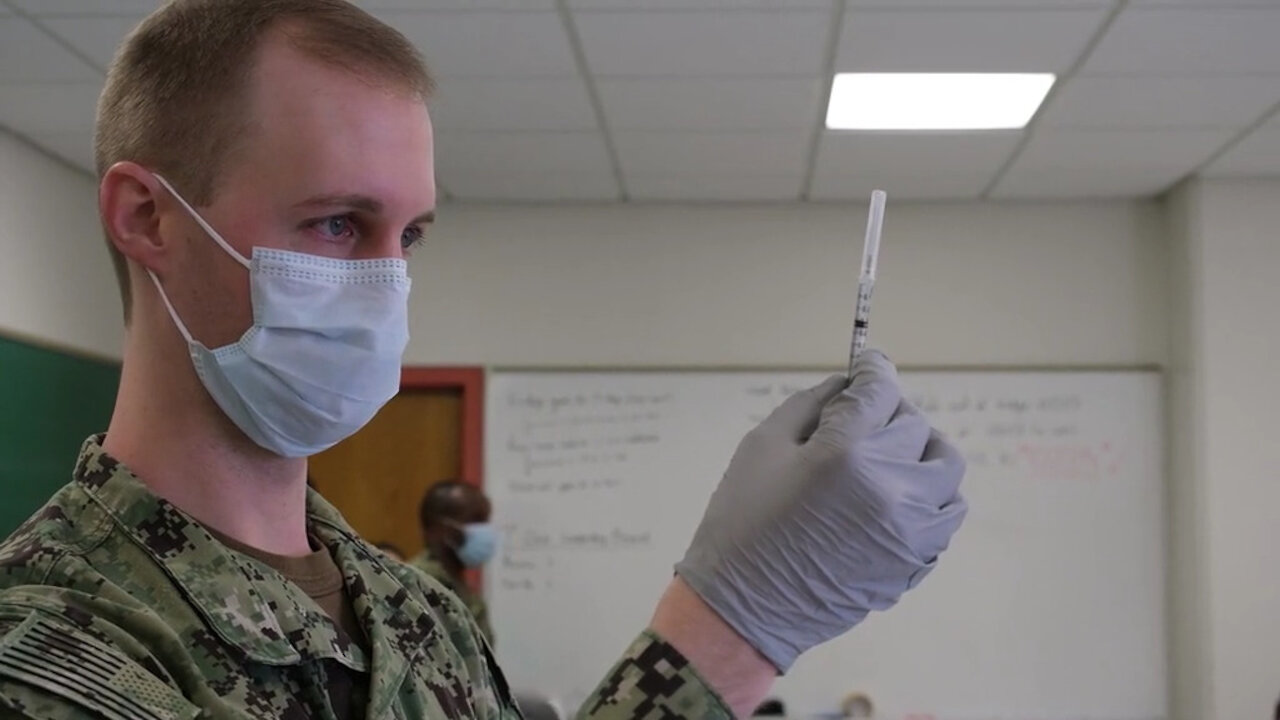 U.S. Navy Sailors prepare COVID-19 vaccines at Queens Community Vaccination Center