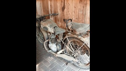 very old motorcycle a bit dusty