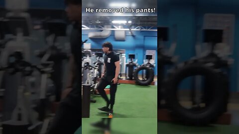 He is removing his pants in the gym! #shorts