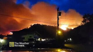 Blazing fire lights up the night sky in British Columbia