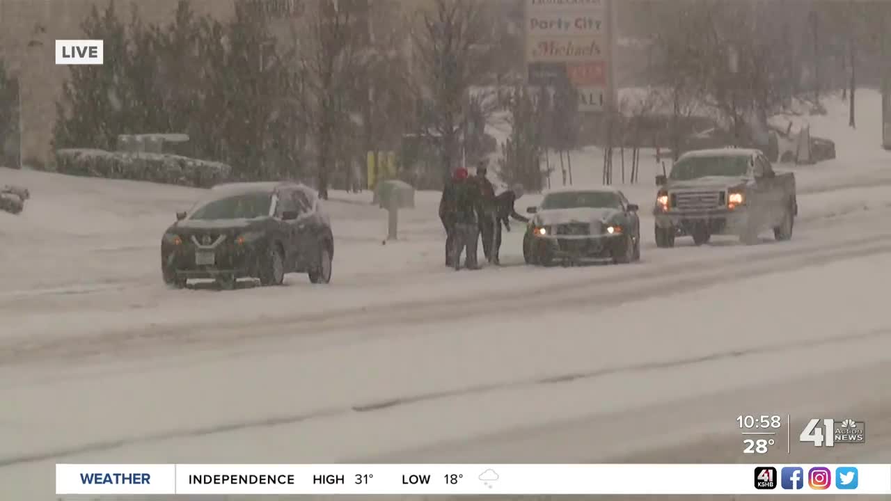 Cars stuck in snow in Olathe