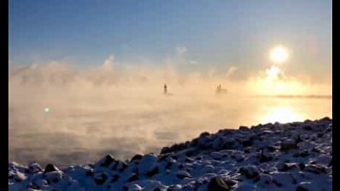 Magical morning mist forms over lake in the US