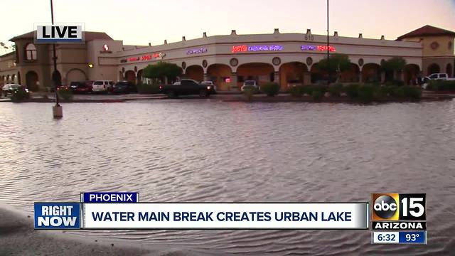 Massive water main break hits north Phoenix strip mall
