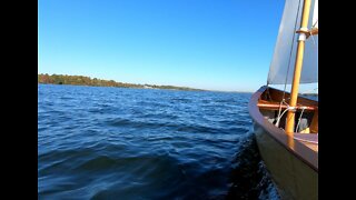 Sailing Grace: Peak Fall Colors, Smiling Breeze