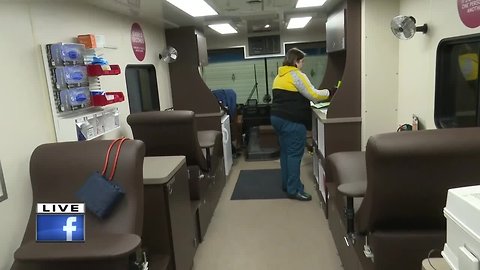 Checking out the inside of The Community Blood Center blood mobile