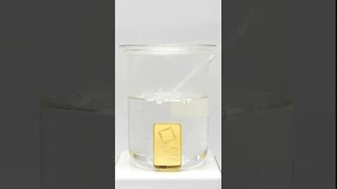 Dissolving a bar of pure gold in acid