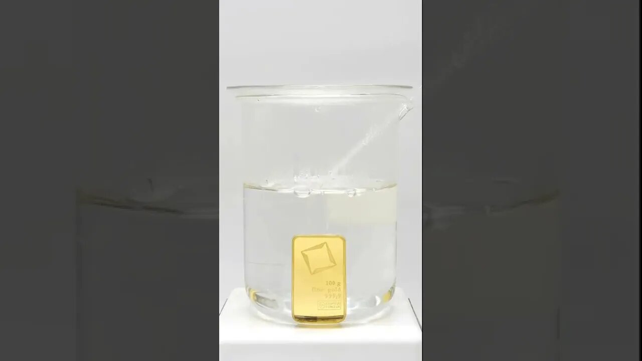 Dissolving a bar of pure gold in acid