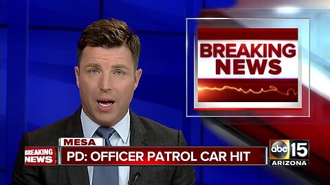 Mesa officer's patrol car hit