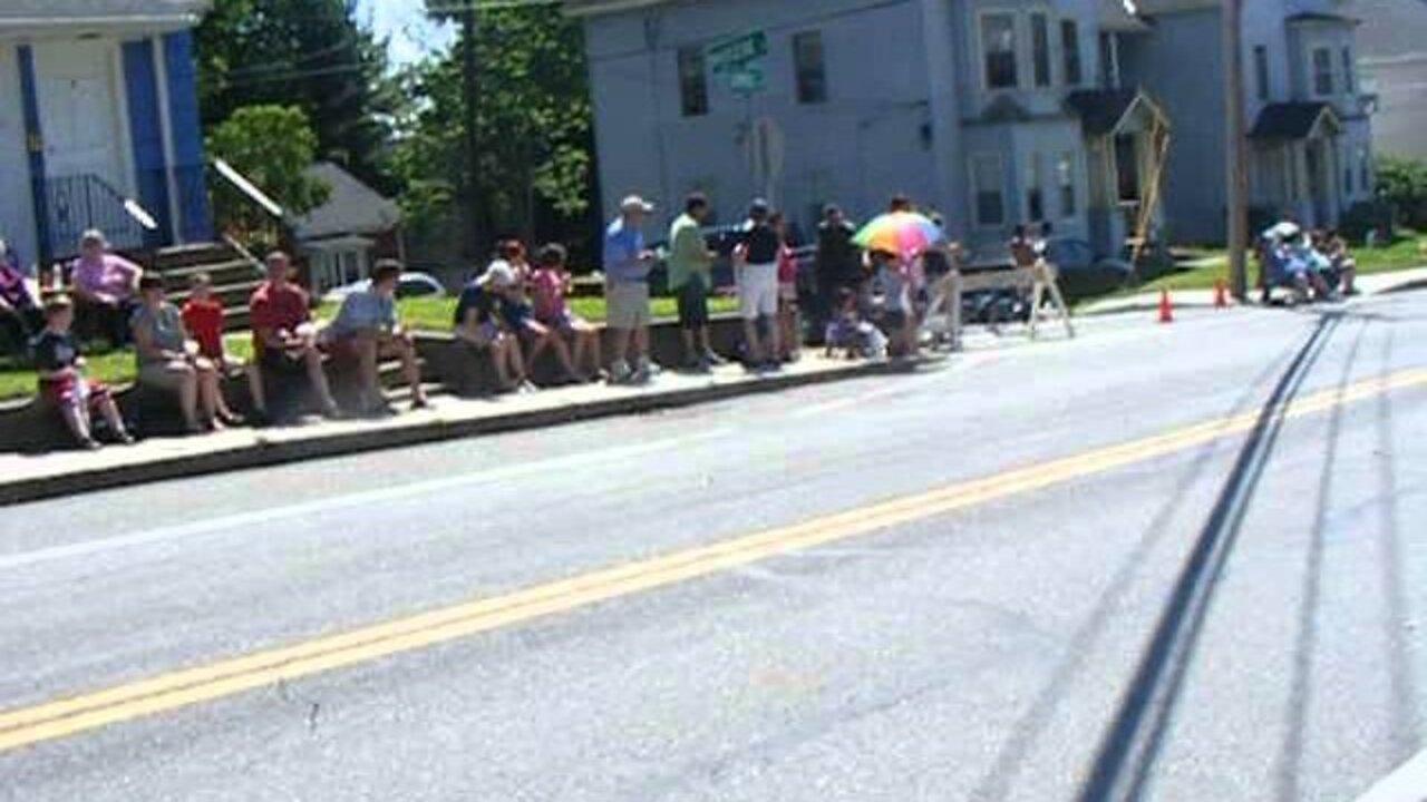 4th of july parade 2013 fitchburg clip 4 bagpipes and pols