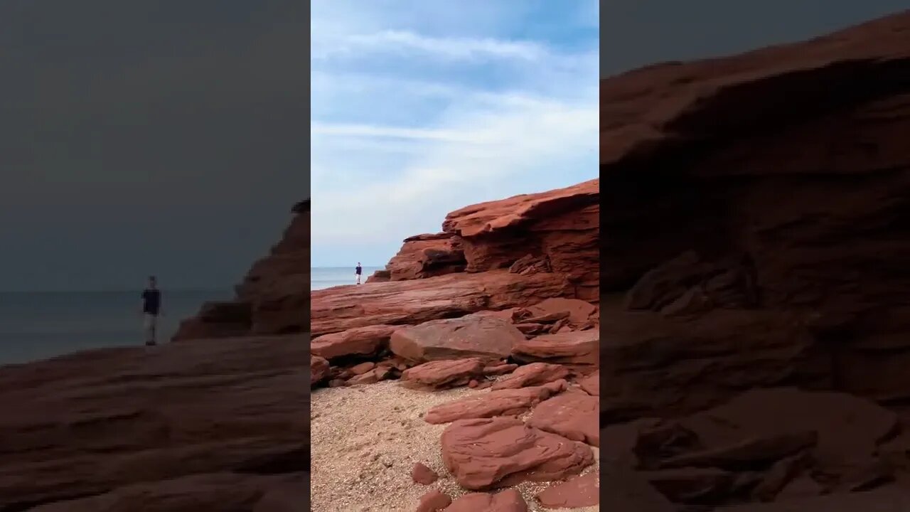 Jason Dunn waving at the beach 👋