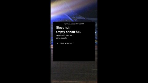 I see a glass full of either