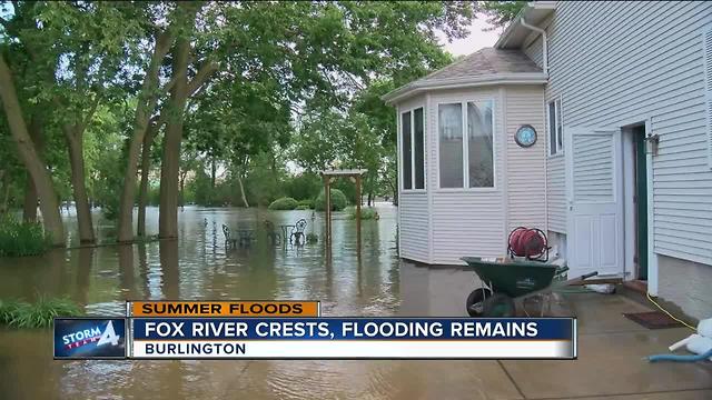 Residents clean up after flash floods wreak havoc on Burlington