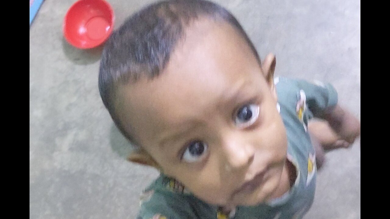 angry baby looking fot what?
