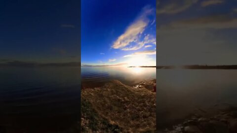Deep blue sky as waves pass