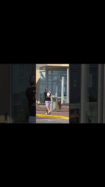 Walking around with a lizard on his shoulder