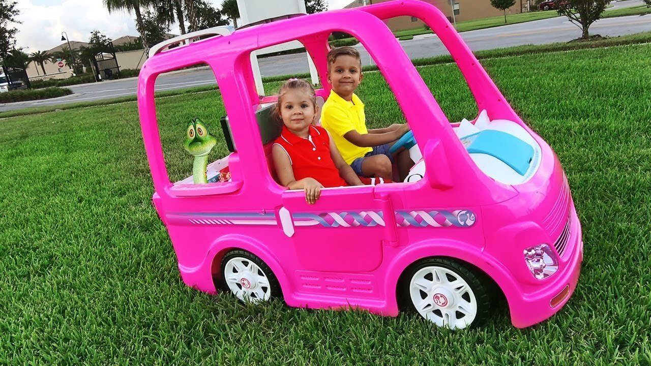 Diana and Roma go on a picnic in a Barbie car