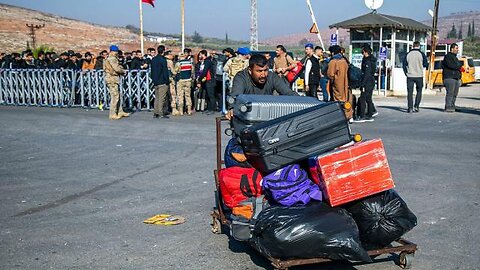 Syrian refugees wait at Turkish border, eager to return home after fall of Assad's government