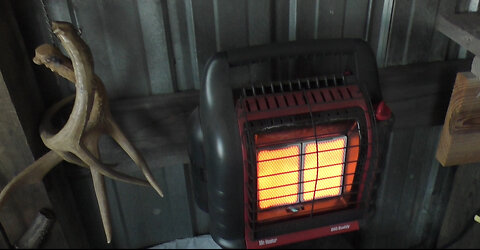 Morning coffee, hunting shack, heater & deer.